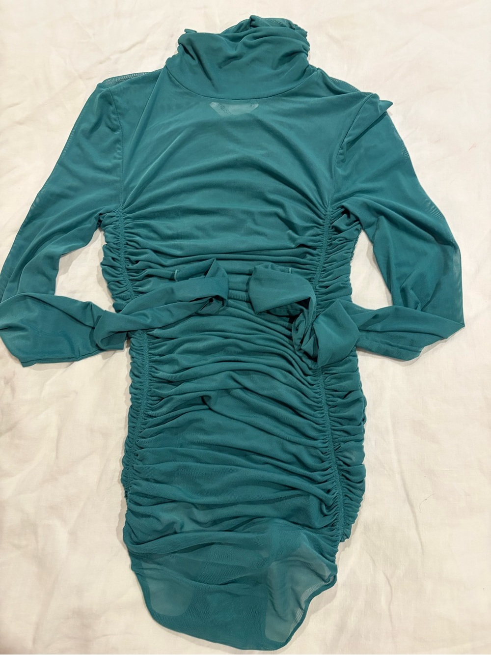 Free People ruched sheer bodysuit. Never worn. New with tags.